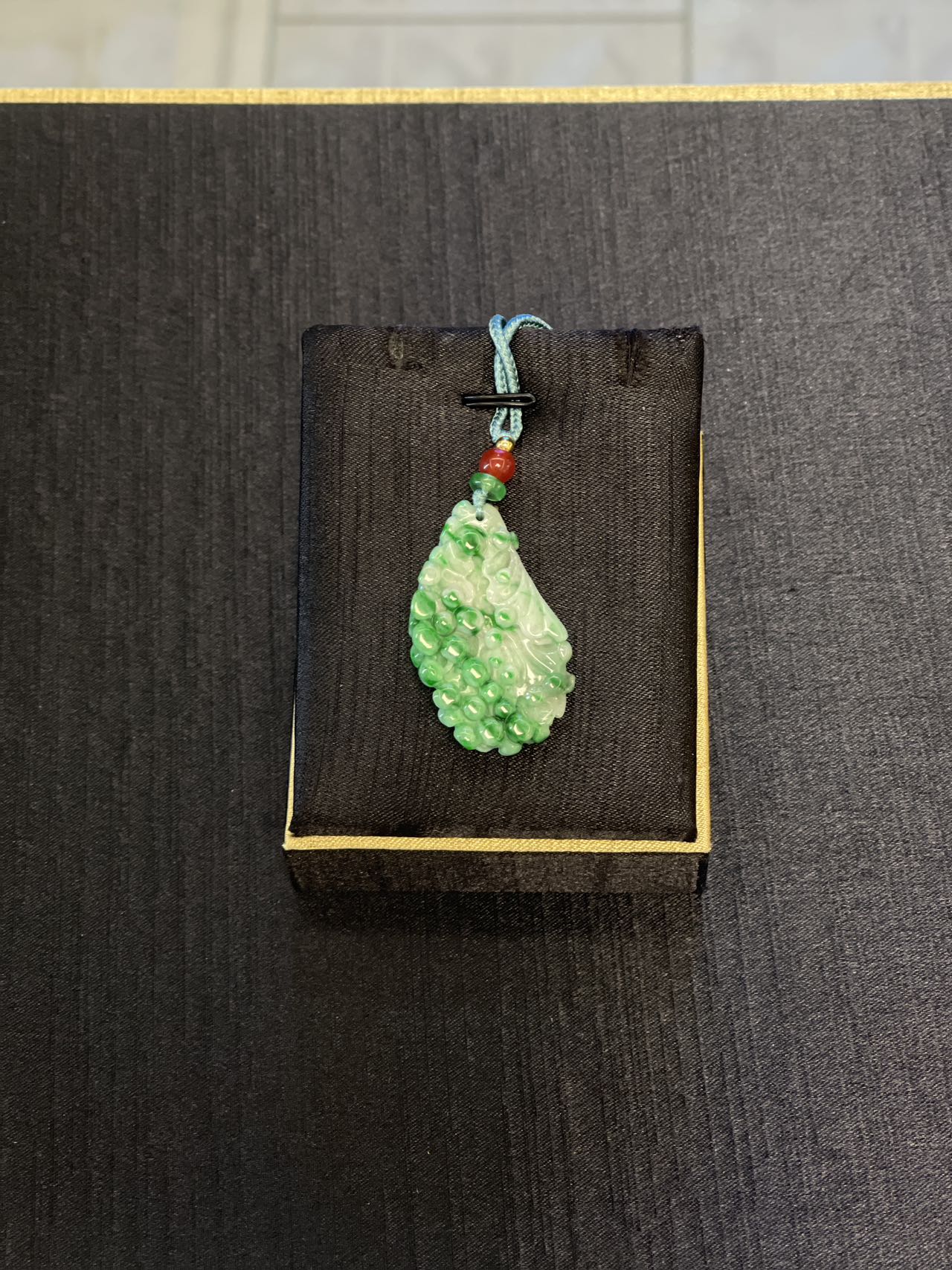 burmese jadeite pendant--phoenix tail