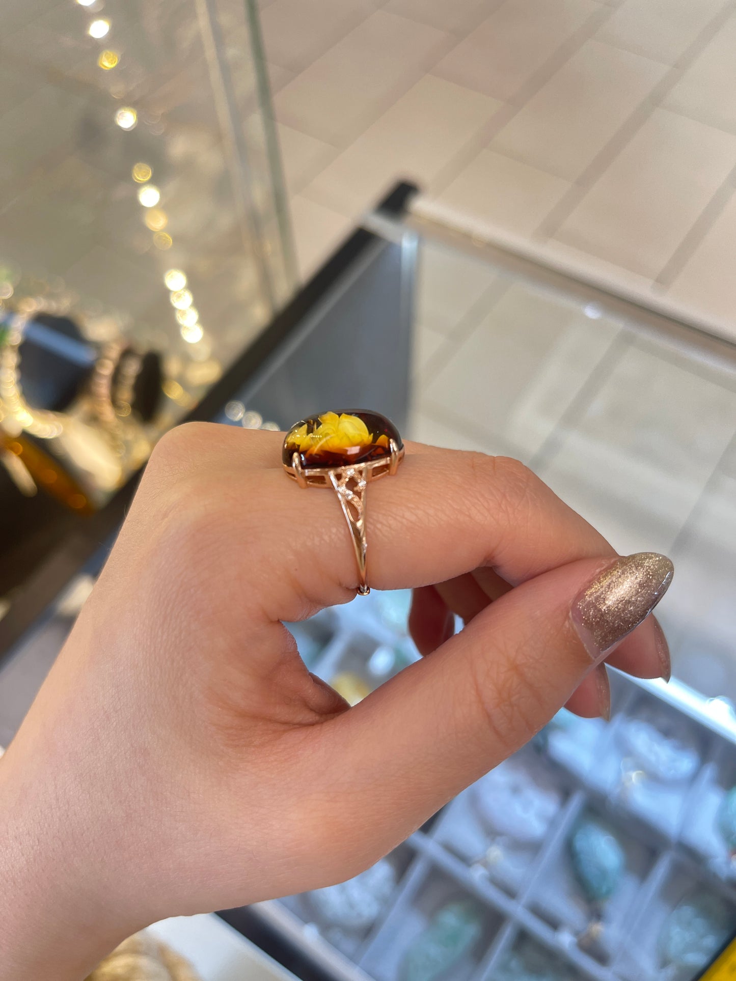 Burmese Amber Ring and Flower Carving